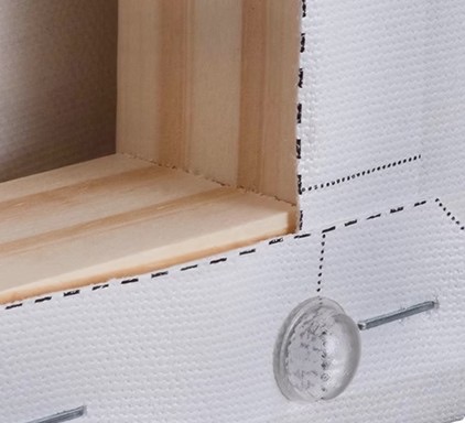 Close-up of the hanging hardware stopper on a canvas print