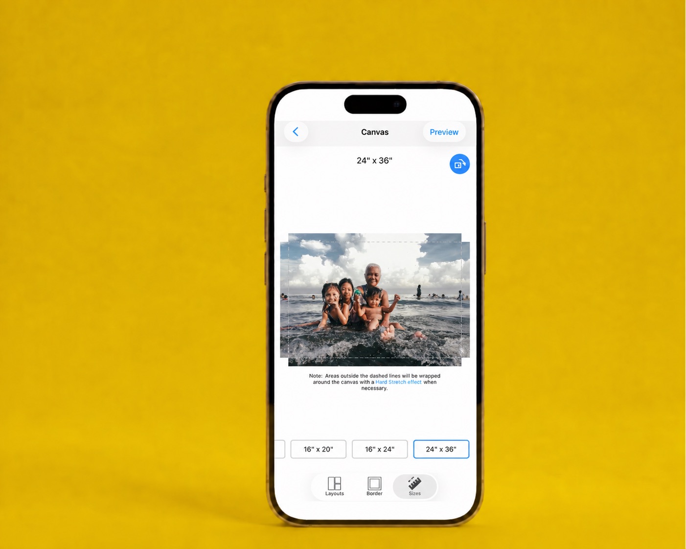 The SimplePrints app showing a 24×36 canvas print of a family swimming in the sea