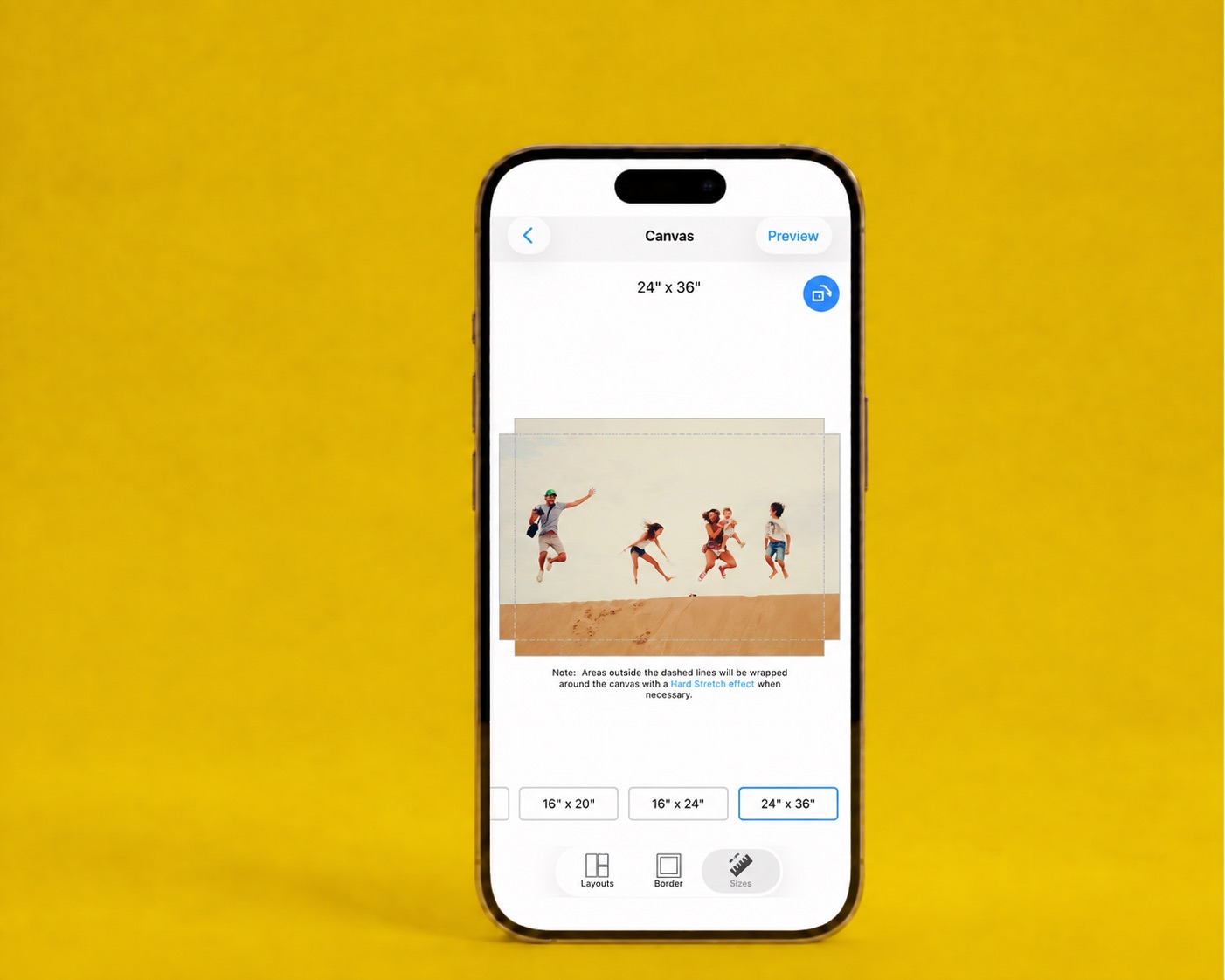The SimplePrints app showing a 24×36 canvas print of friends jumping on a beach
